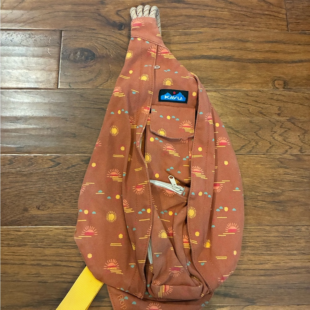 Kavu Terracotta Sling Bag with Sunburst Design